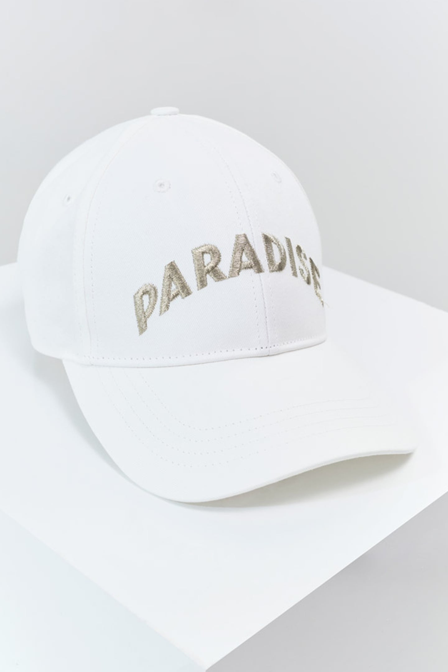 ABACA - WHITE CAP WITH GOLD MESSAGE EMBROIDERY 1